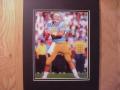 Picture: Troy Aikman in the pocket UCLA Bruins original 8 X 10 photo professionally double matted to 11 X 14 and ready for a standard frame.
