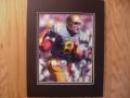 Picture: Troy Aikman runs original UCLA Bruins 8 X 10 photo professionally double matted to 11 X 14 and ready for a standard frame!