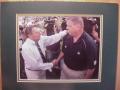 Picture: Charlie Weiss of the Notre Dame Fighting Irish with Joe Paterno of Penn State 8 X 10 photo professionally double matted to 11 X 14 so that it fits a standard frame.